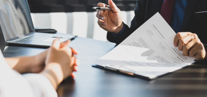 Lawyer discussing a breach of contract with client